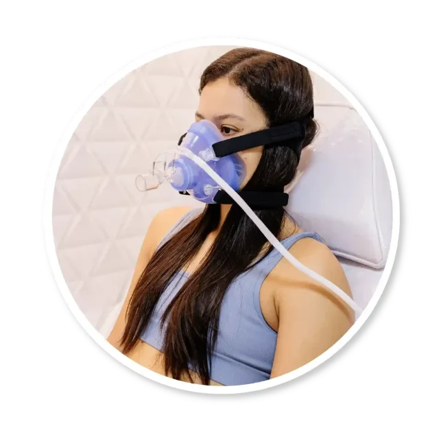 Paciente realizando o exame de calorimetria indireta